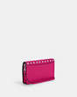COACH®,ANNA FOLDOVER CLUTCH CROSSBODY WITH RIVETS,Mixed Material,Silver/Cerise,Angle View