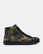 COACH®,CLIP HIGH TOP SNEAKER IN SIGNATURE CANVAS WITH CAMO PRINT,Leather,Gunmetal/Green Multi,Angle View