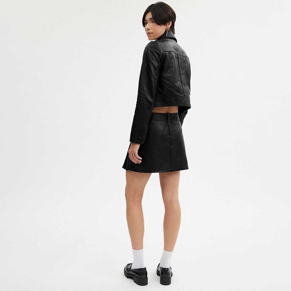 Shop Coach Heritage C Leather Mini Skirt In Black