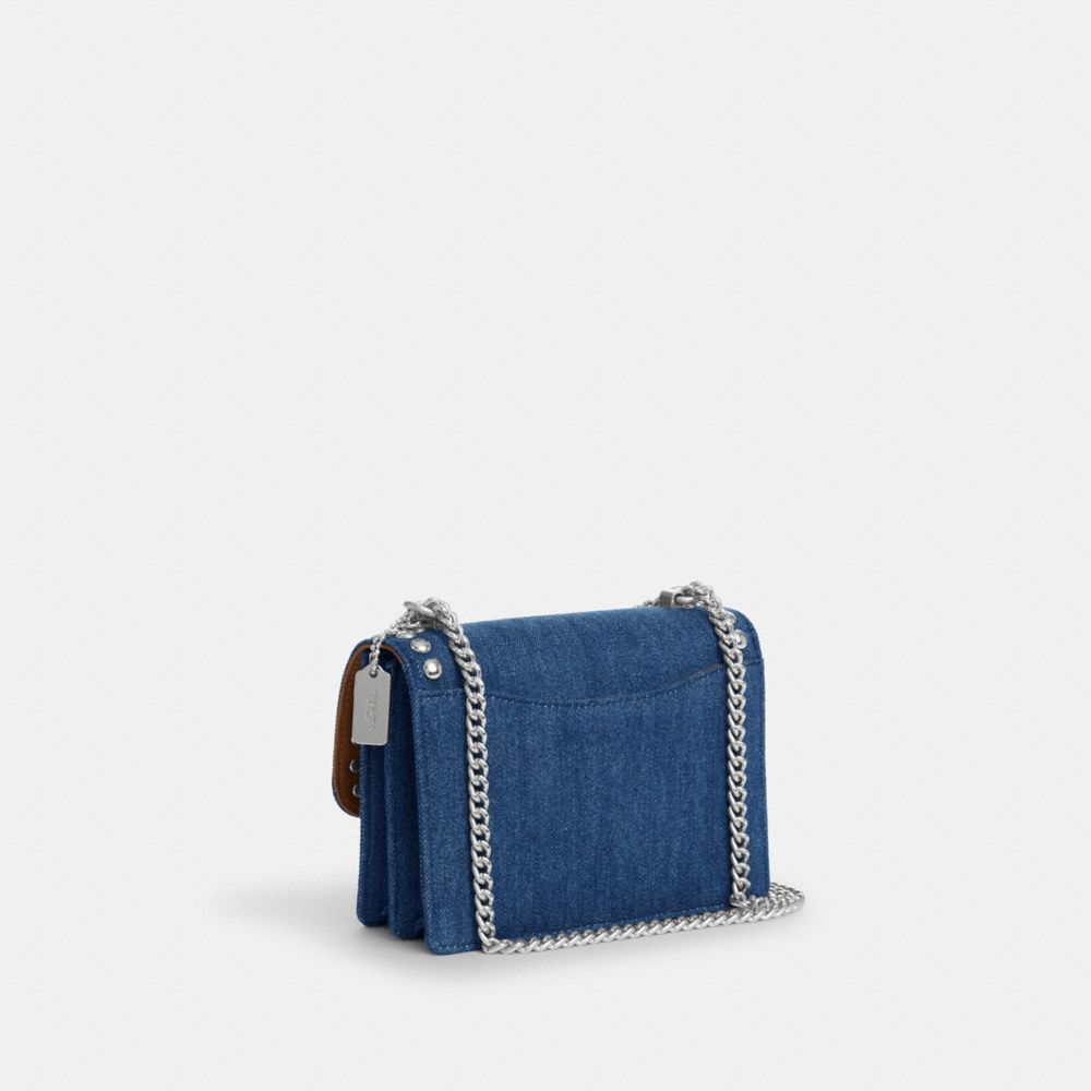 COACH®,MINI KLARE CROSSBODY WITH RIVETS,Denim,Silver/Denim,Angle View