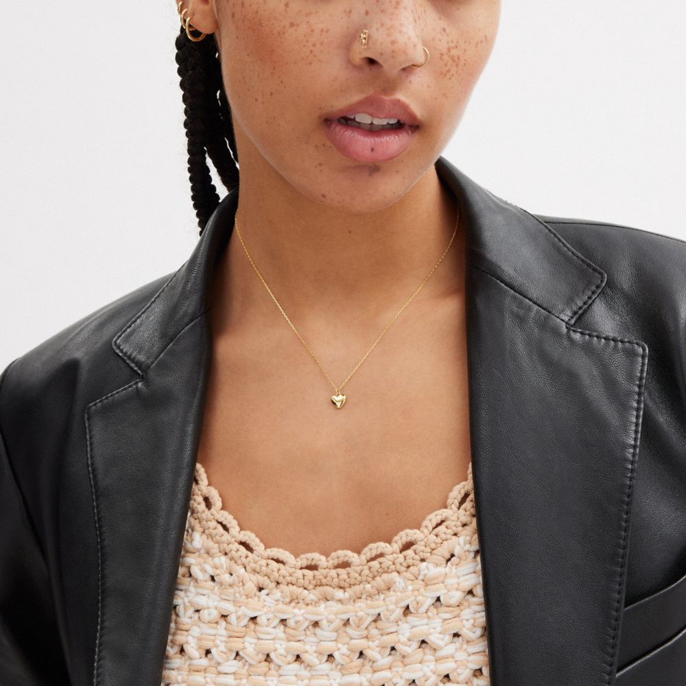 COACH®,14 K Gold Heart Pendant Necklace,Single Strand,Diamond,Gem Embellishment,Celestial Embellishment,14 Kt Gold,Casual,Clear,Detail View