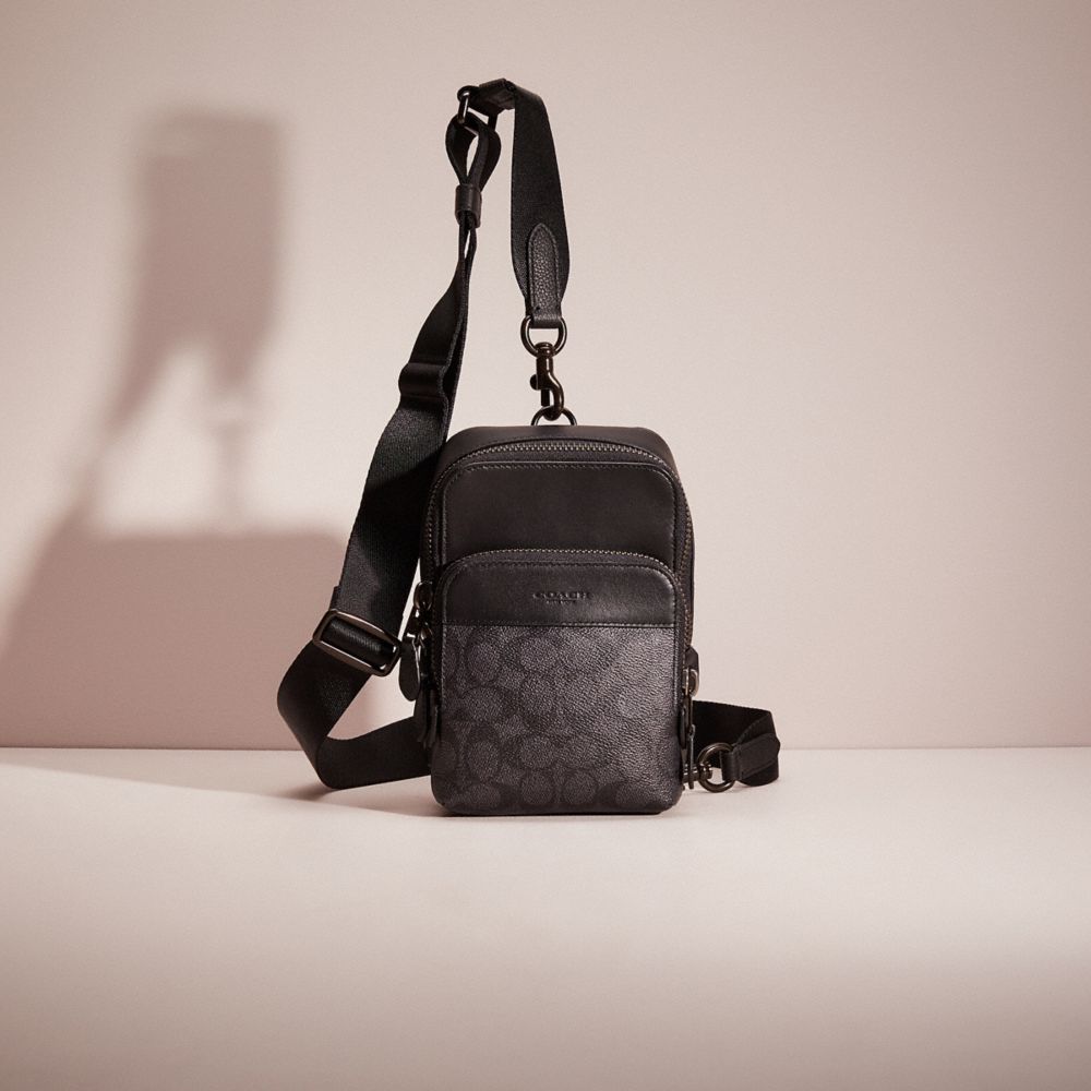 Coach Restored Gotham Sling Pack 13 In Signature Canvas In Charcoal