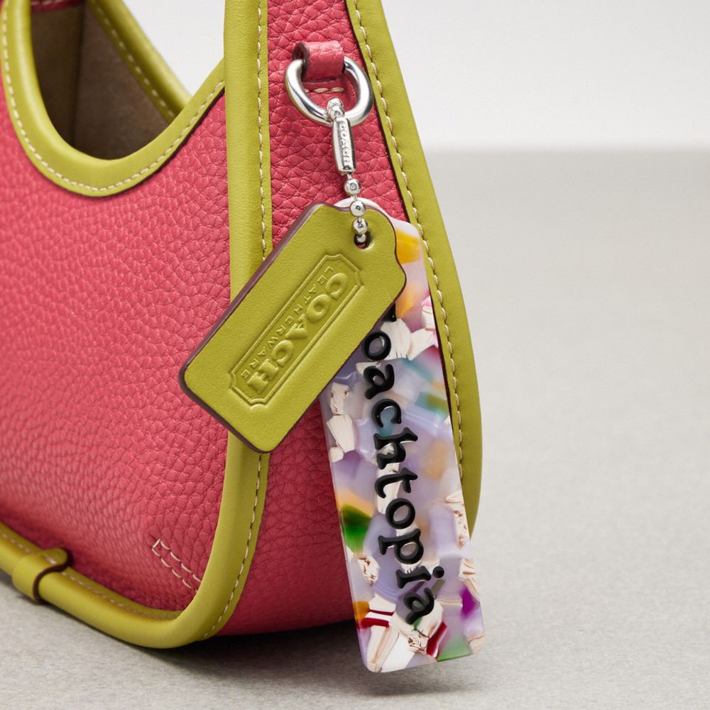 COACH Small Pebble Pink Leather Wristlet