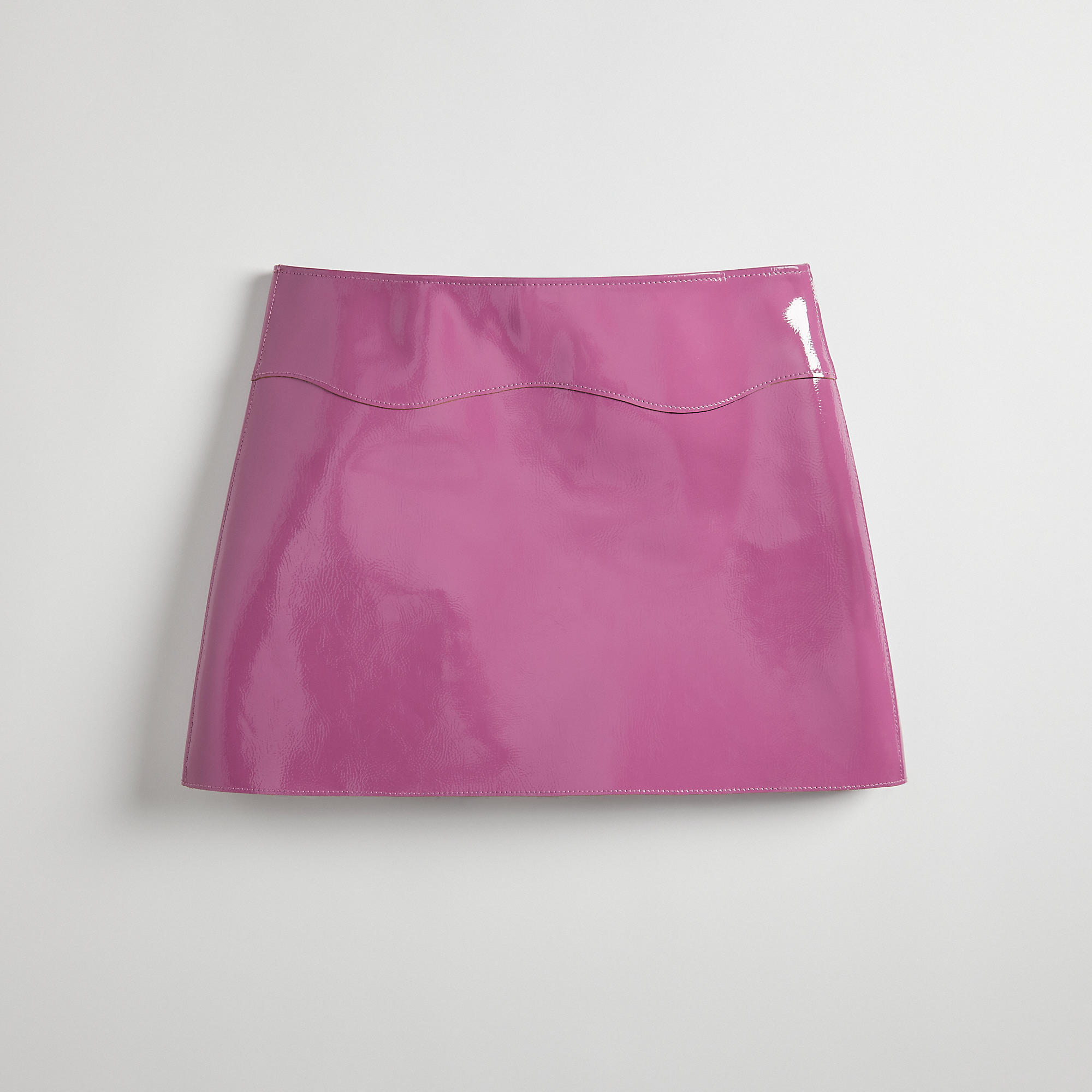 Coach Outlet Wavy Mini Skirt In Crinkle Patent Coachtopia Leather In Pink