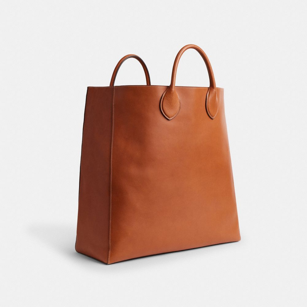 COACH®,LEO TOTE,Leather,Runway,Brass/Tan,Angle View