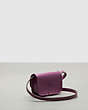 COACH®,Wavy Wallet with Crossbody Strap in Crinkled Patent Coachtopia Leather,Mini,Lilac Berry,Angle View
