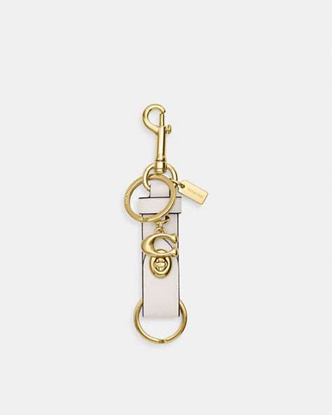 COACH®,TRIGGER SNAP BAG CHARM,Gold/Chalk,Front View
