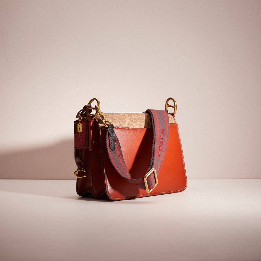 COACH®,UPCRAFTED BEAT SHOULDER BAG IN SIGNATURE CANVAS WITH HORSE AND CARRIAGE PRINT,School Spirit,Brass/Tan Truffle Rust,Angle View