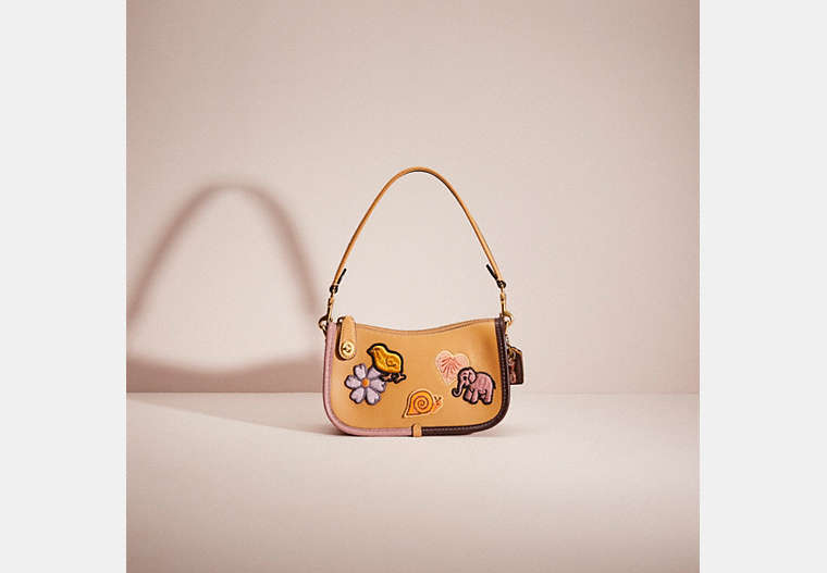 COACH®,UPCRAFTED SWINGER 20 WITH CREATURE PATCHES,Brass/Light Tan Multi,Front View