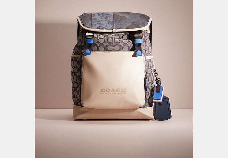 COACH®,UPCRAFTED LEAGUE FLAP BACKPACK IN SIGNATURE JACQUARD,Black Copper/Navy/Steam,Front View