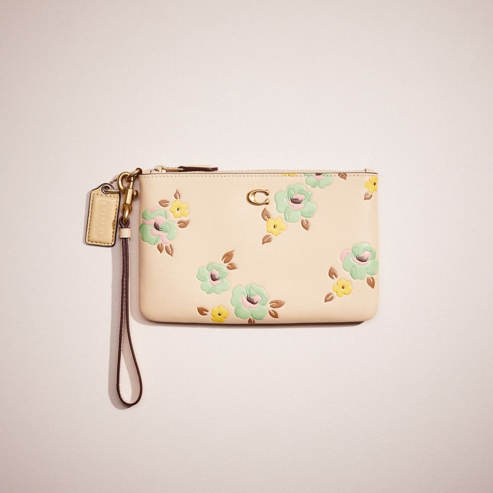 Coach Restored Small Wristlet With Floral Print In Brass/ivory Multi