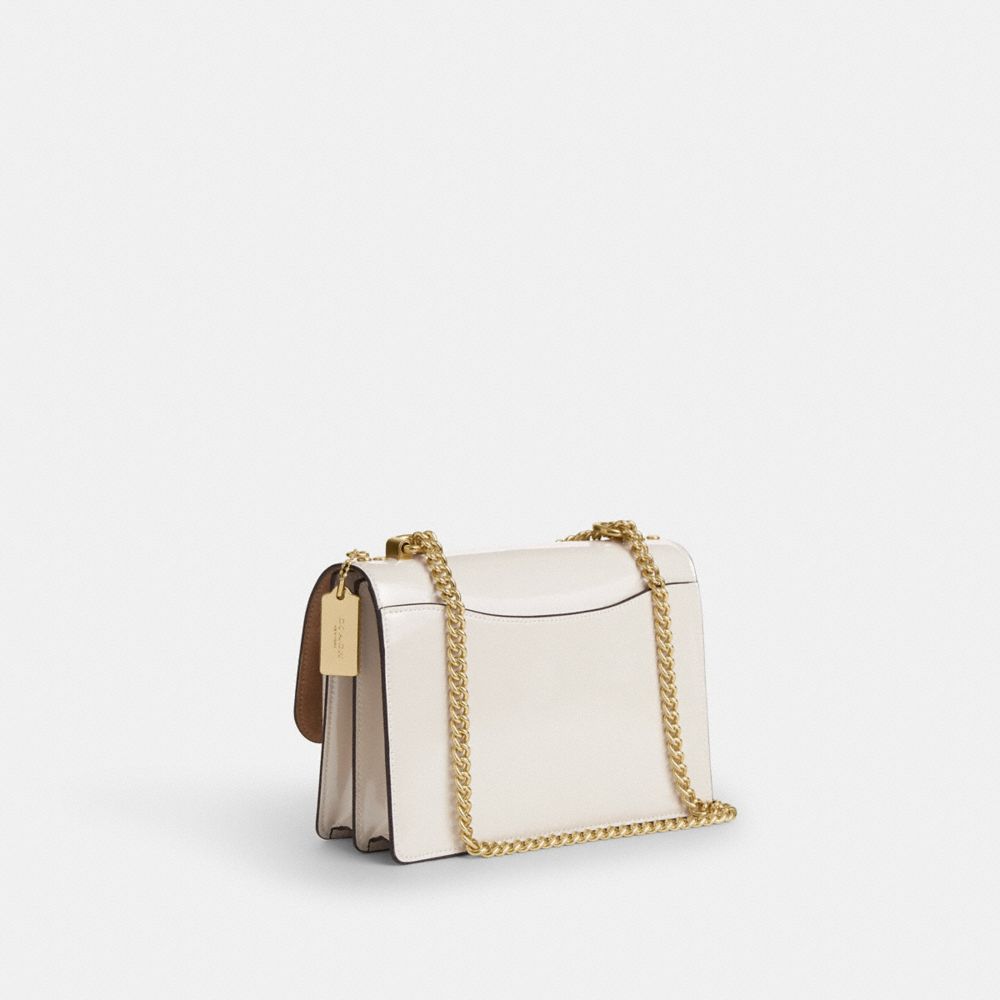 COACH®,Klare Crossbody Bag In Signature Leather,Crossbody,Logo,Metal,Day Party,White,Angle View