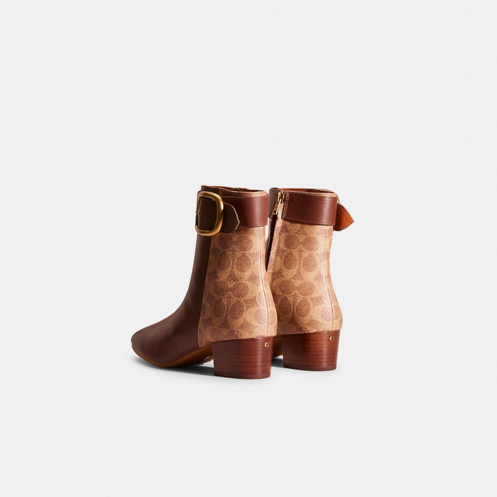 Shop Coach Restored Cassandra Bootie In Dark Saddle/tan