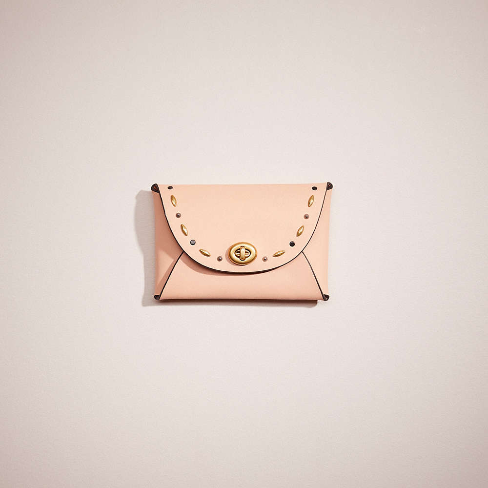 Coach Remade Medium Pouch With Prairie Rivets In Pink