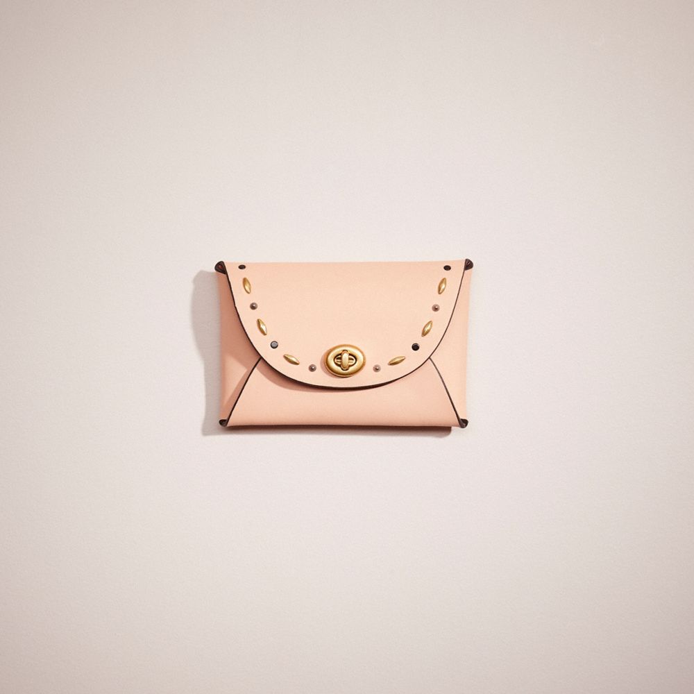 Coach Remade Medium Pouch With Prairie Rivets In Pink