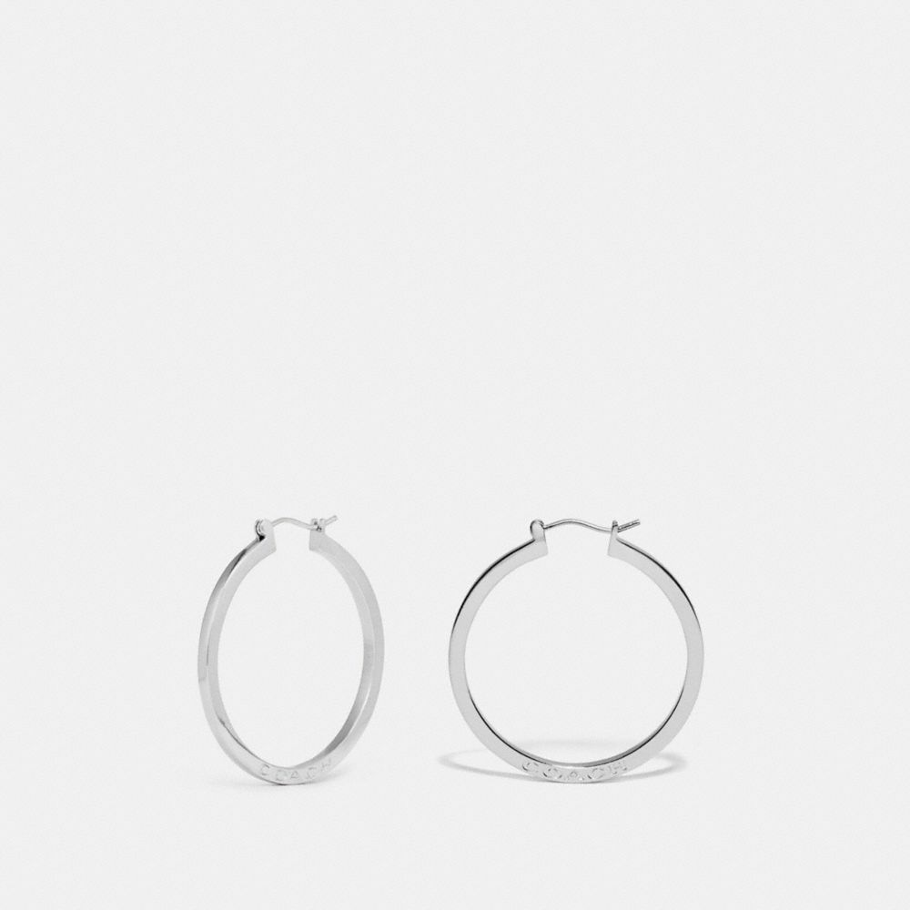 silver coach hoop earrings