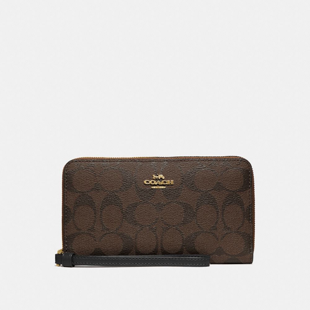 COACH® Outlet Large Phone Wallet In Signature Canvas