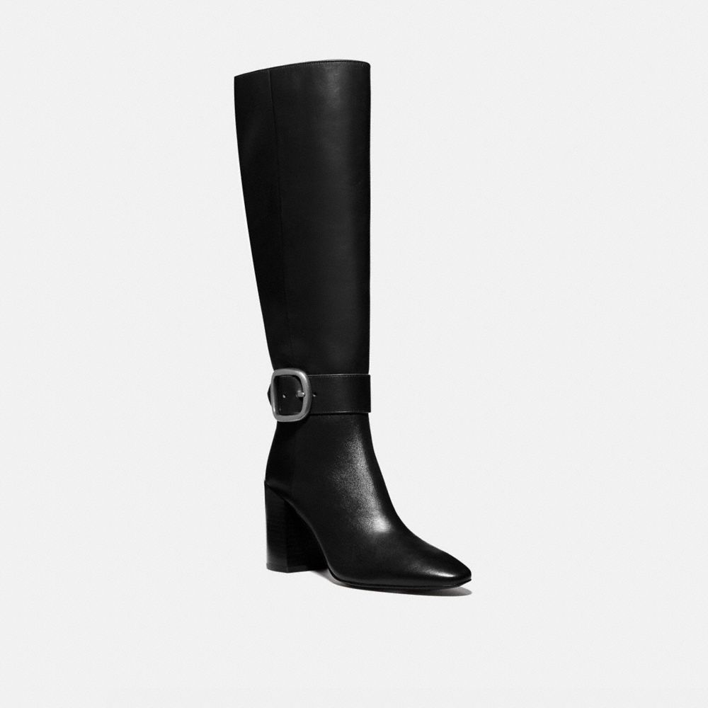 black tights with tan ankle boots