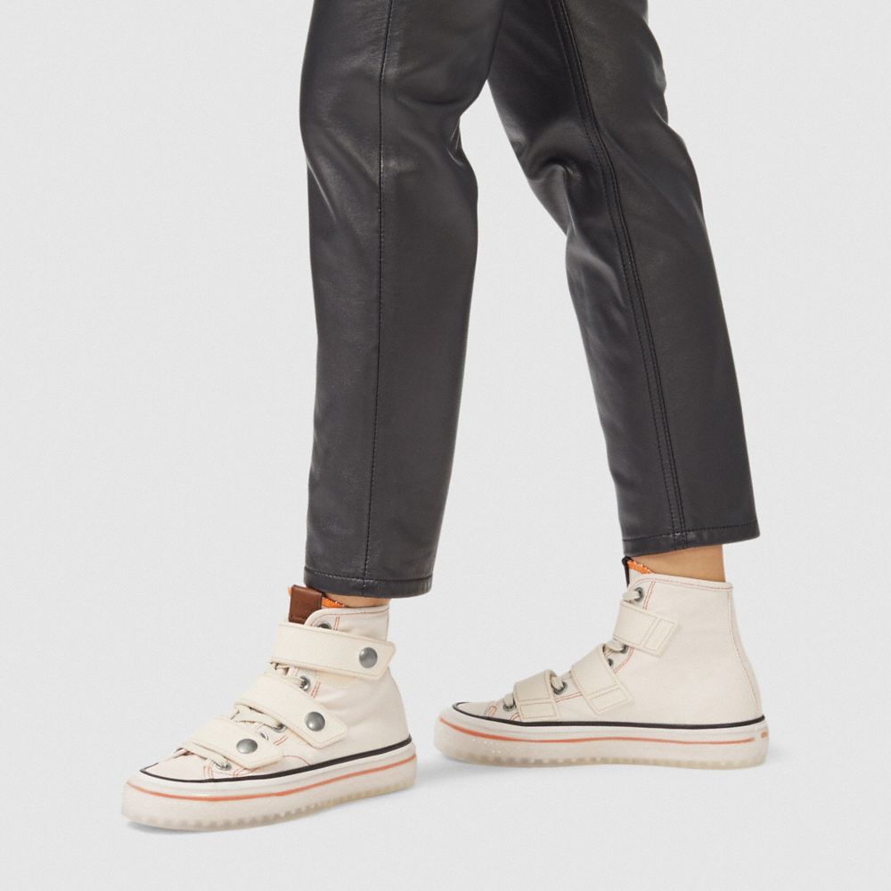 coach high top button up sneaker