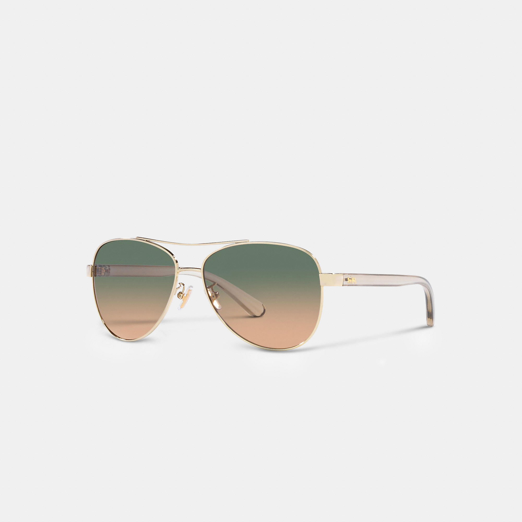 Shop Coach Outlet Horse And Carriage Pilot Sunglasses In Green Yellow Gradient
